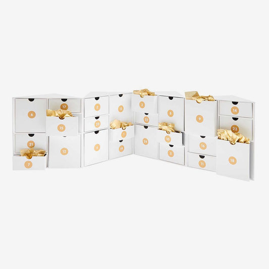 Armoire à tiroirs avec stickers chiffres or pour calendrier de l'avent