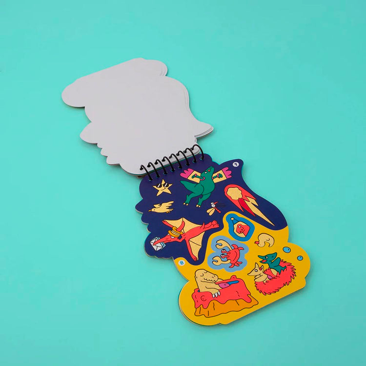 Carnet dinosaure à glisser dans une pochette cadeau