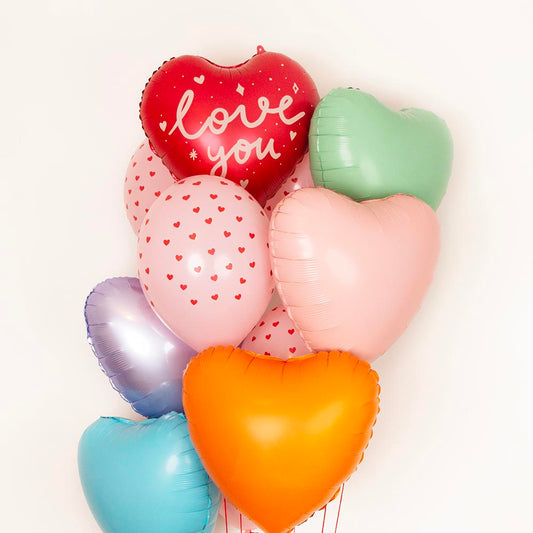 Grappe de ballons coeur pour la Saint Valentin dans les tons pastel