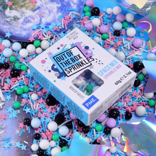 Confettis en sucre colorés pour décorer un gâteau astronaute