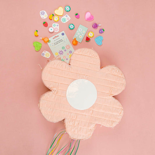 Piñata fleur rose pour une fête printanière ou baptême