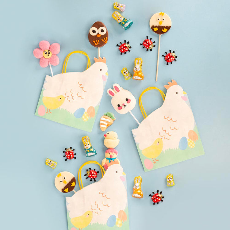 chasse aux oeufs pour paques avec nos sacs poules et chocolat