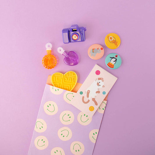 Pochette smiley mauve pour fête joyeuse et petits cadeaux