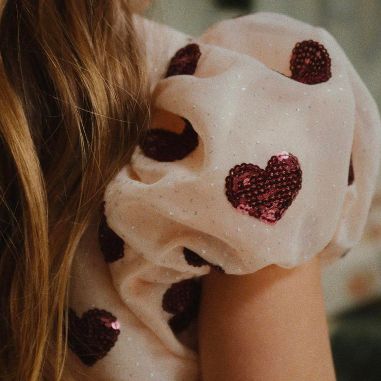 Robe de princesse rose coeurs rouges : déguisement enfant anniversaire