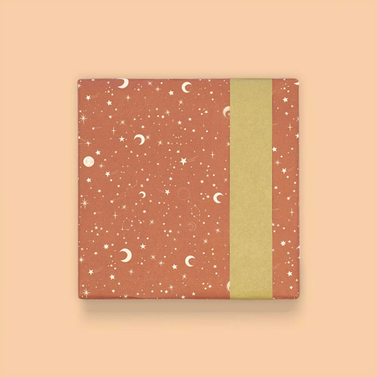 Papier cadeau étoilé terracotta pour anniversaire
