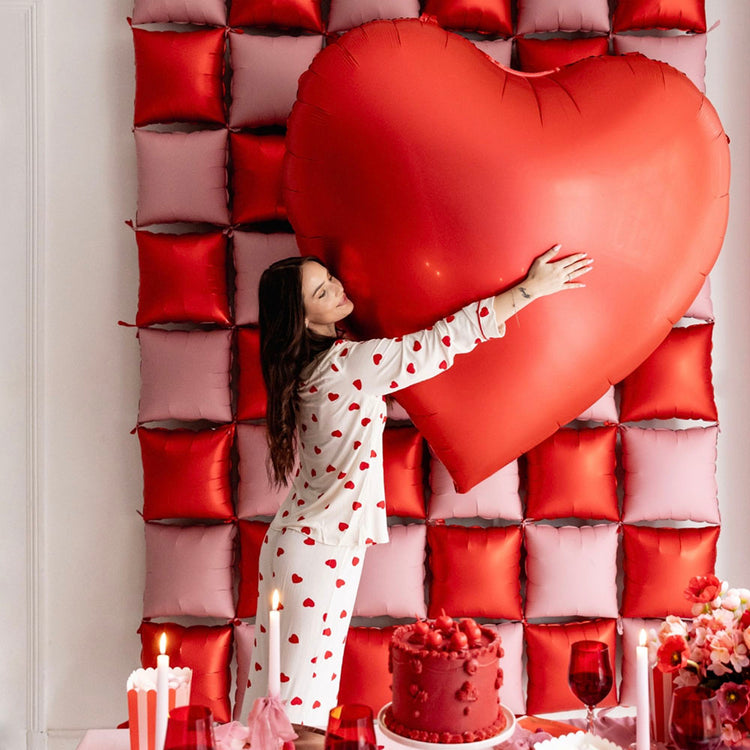 Ballon coeur rouge gigantesque parfait pour un anniversaire coeur