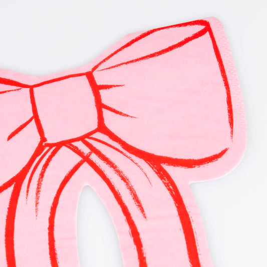 Serviettes roses à nœuds, élégance pour table d’anniversaire