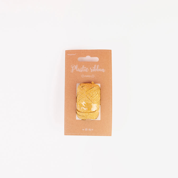 Bobine de ruban à paillettes dorées pour ballons helium et papiers cadeaux.