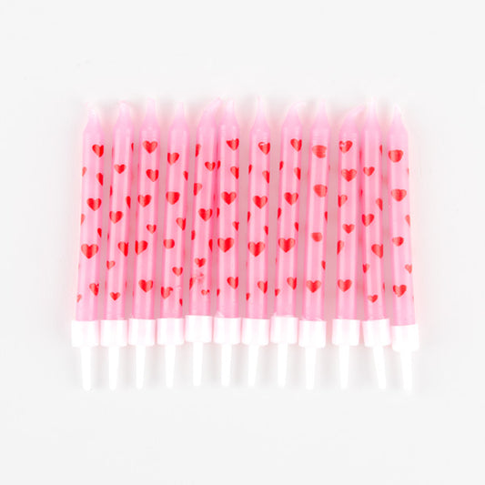 Bougies d'anniversaire roses et coeurs pour un anniversaire thème princesse.