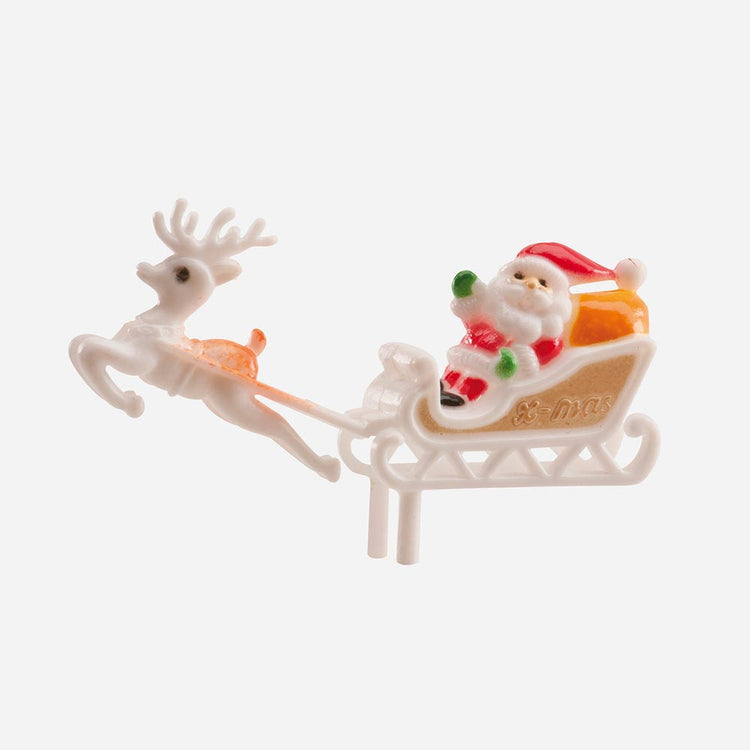 Traineau de pere noel blanc et rouge pour decorer une buche de noel