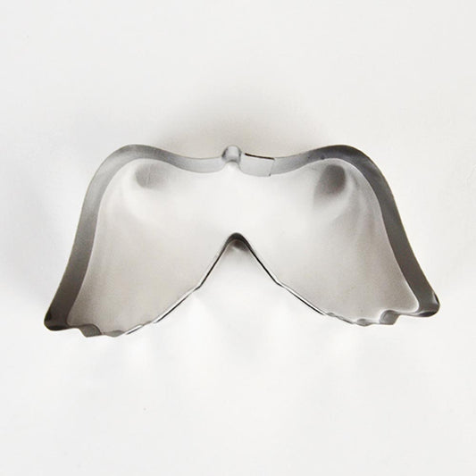 Emporte piece en forme d'ailes d'ange pour des biscuits de Noël