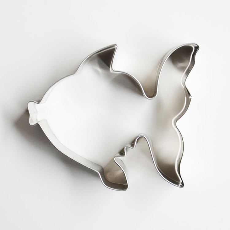 Emporte piece en forme de poisson pour des biscuits d'anniversaire sirène