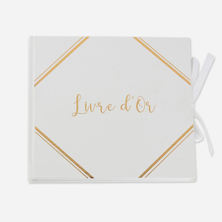 Deco de mariage : livre d'or blanc avec dorures et ruban blanc satiné