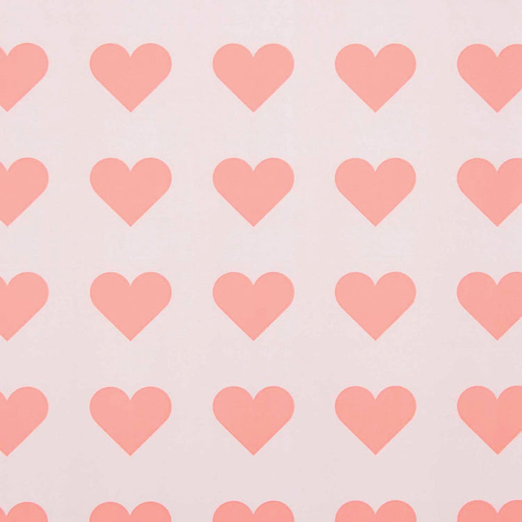 Papier cadeau motif coeurs pour faire des paquets cadeaux anniversaire