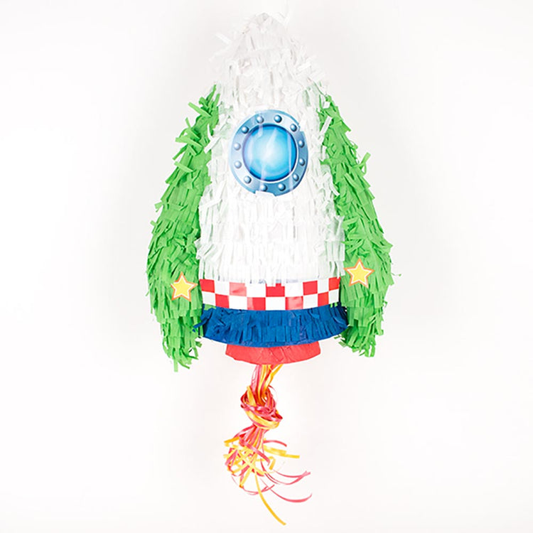 1 pinata en forme de fusée pour un anniversaire d'enfant sur le thème de Star Wars ou d'Astroboy. Remplissez cette pinata de bonbons et de petits cadeaux pour les enfants !