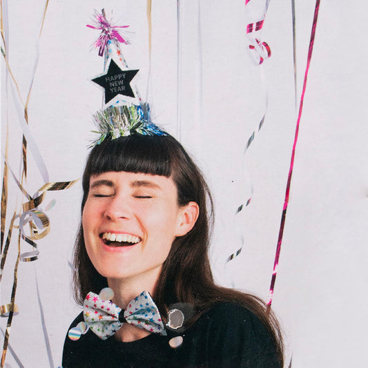 Des jolis serpentins dorés pour compléter la décoration de votre fête