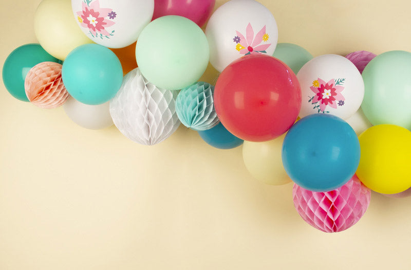 Mother's Day decoration idea: arch of flower balloons and honeycomb balls