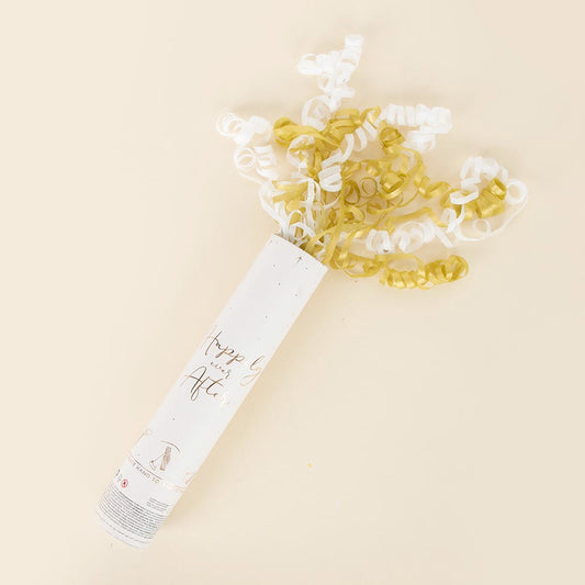 White and gold serpentine confetti cannon: wedding accessory