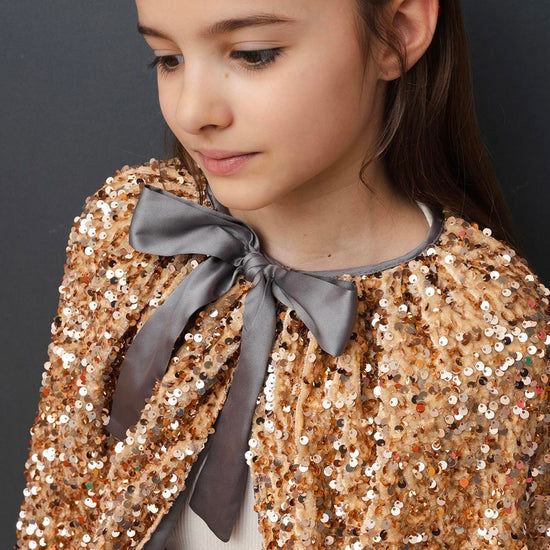 Cape à sequins dorée : déguisement pour enfant
