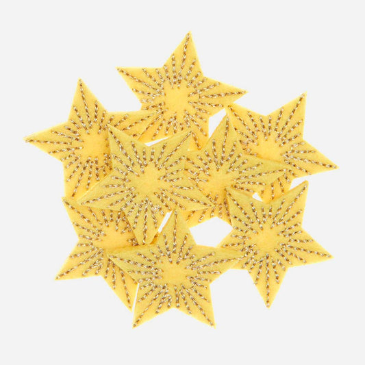 Confettis en feutrine étoiles jaunes : decoration de table noel