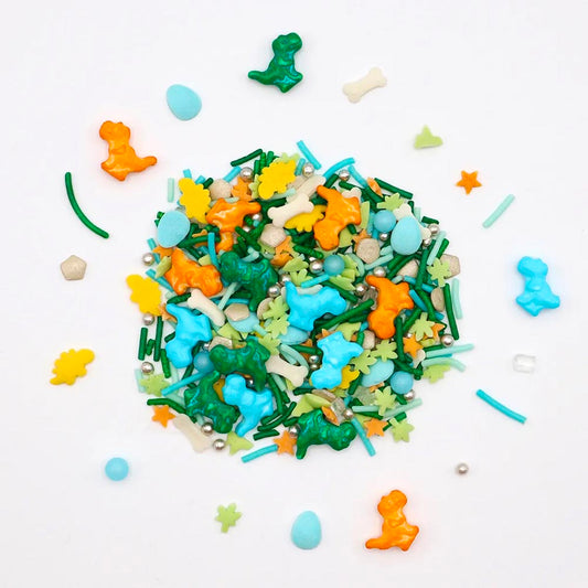 Confettis en sucre colorés pour décorer un gâteau dinosaure