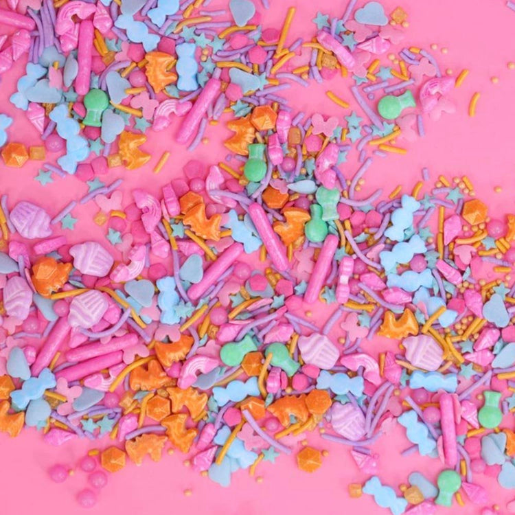 Confettis en sucre colorés pour décorer un gâteau licorne