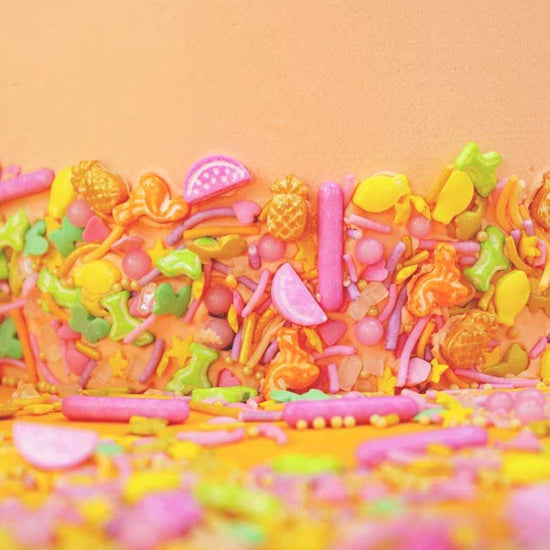 Décoration sucrée thème tropical hyper colorées pour gâteau