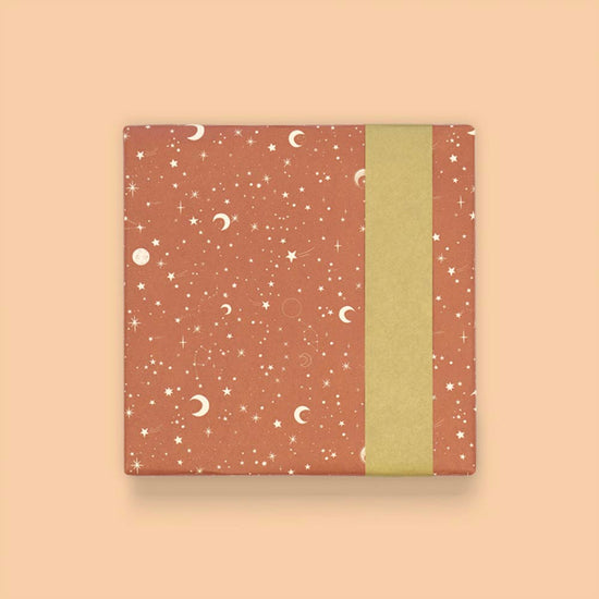 Papier cadeau étoilé terracotta pour anniversaire