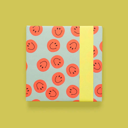 Papier cadeau smiley orange à offrir