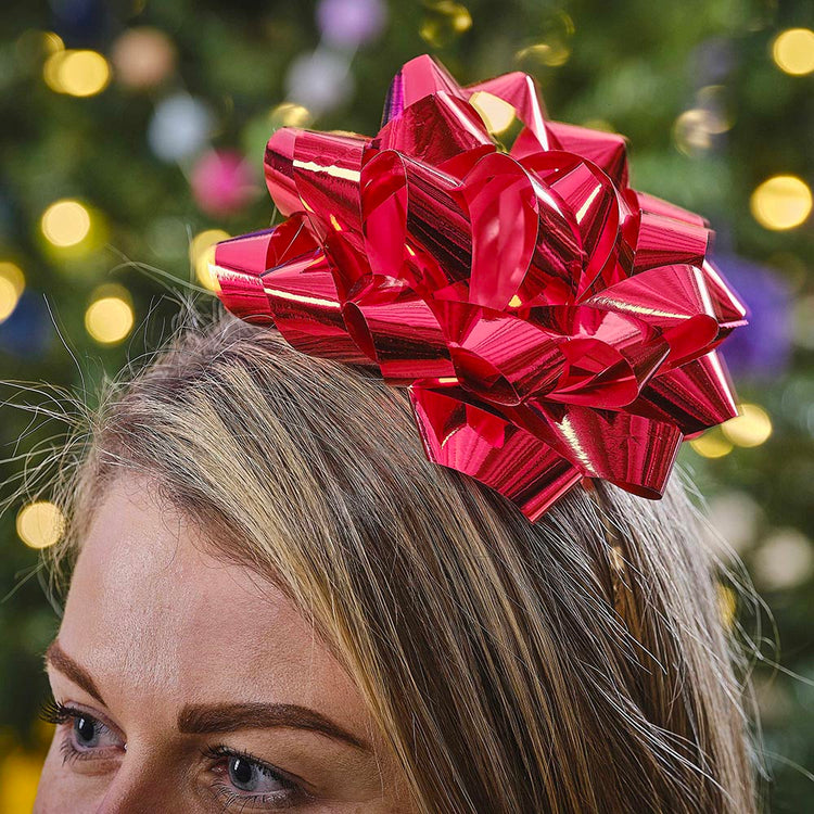 Accessoire de Noël : un serre-tête gros noeud rouge