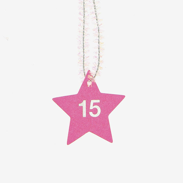 Etiquete estrellas rosas numeradas del 1 al 24 para el calendario de adviento de bricolaje