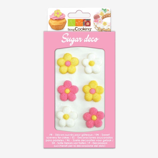 6 sugar decorations in the shape of pink, white and yellow flowers