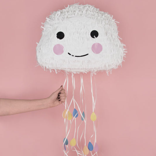 Child birthday pinata in the shape of a cloud with wires to pull to open it