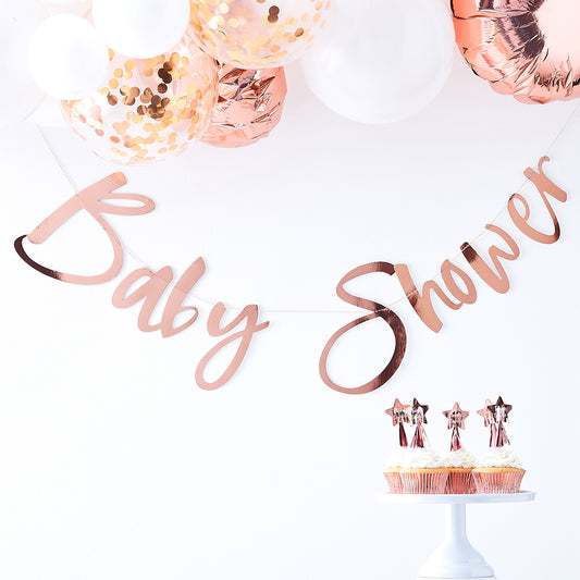 Rose gold girl baby shower decoration: garland and confetti balloons