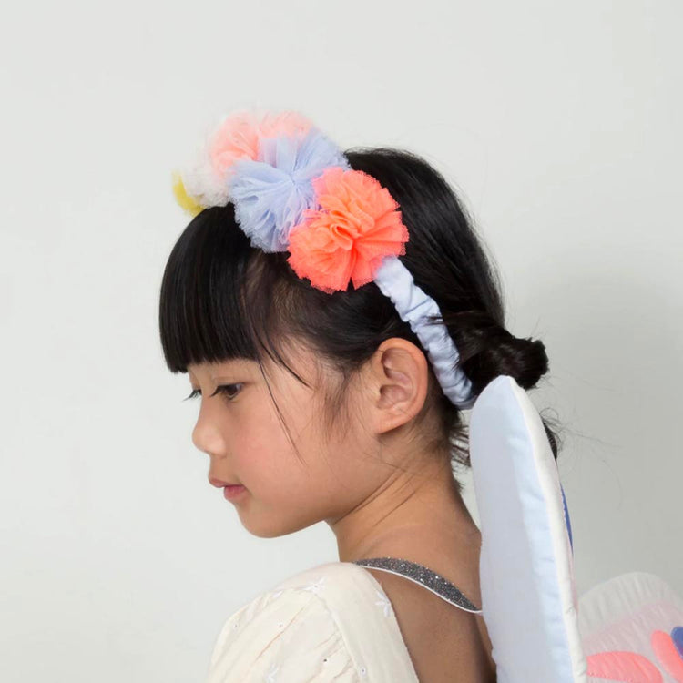 Headband with multicolored pastel pompoms ideal for dressing up at Carnival