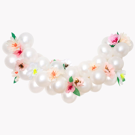pearly balloon arch and tissue paper flowers for party decoration