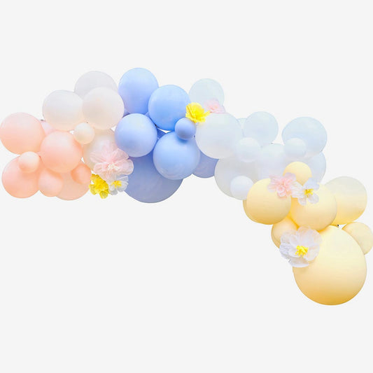 Arch of pastel flower pattern balloons for flower birthday deco