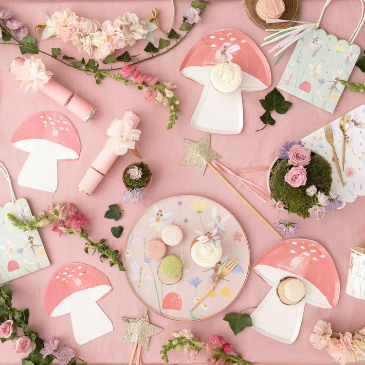 Fairy girl birthday decoration with pastel dishes and mushrooms