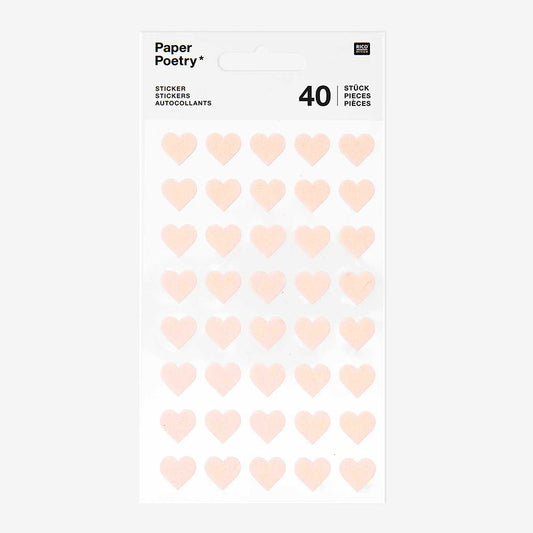 Small pale pink heart-shaped stickers in the shape of hearts creative works