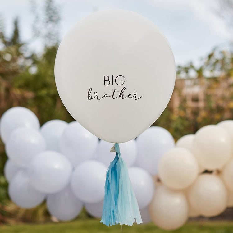 Boy baby shower decoration with big brother balloon and blue arch