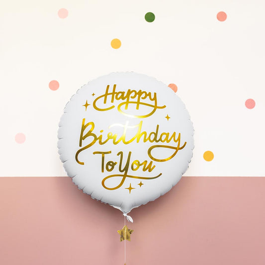 Décoration anniversaire élégante avec ballon blanc et doré happy birthday