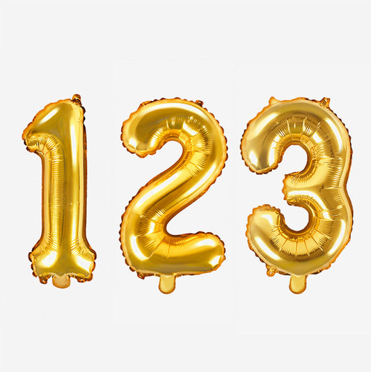 Small golden number balloon for child's birthday decoration, adult birthday