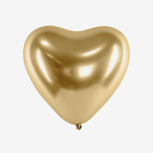 A golden chrome heart-shaped balloon for wedding, birthday Valentine's Day