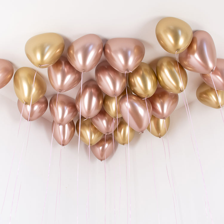 Ceiling of helium heart balloons for wedding room decoration