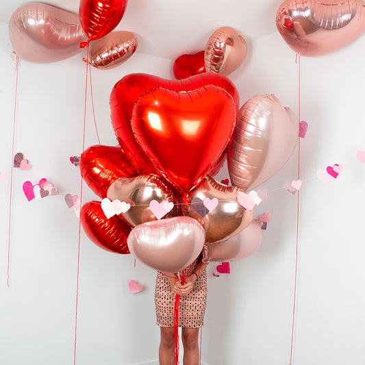 Cluster of giant pink heart balloons for Valentine's Day decoration, wedding decoration