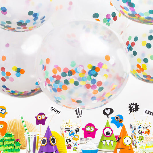 Decoración de cumpleaños infantil multicolor con globos gigantes de confeti