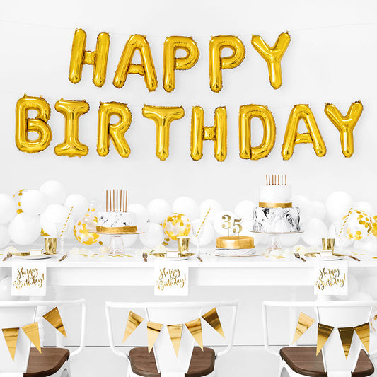 decoración dorada de cumpleaños con globos de feliz cumpleaños