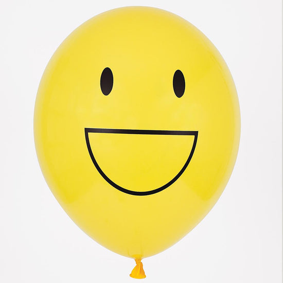 Ballons de baudruche emoji jaune pour décoration anniversaire enfant.