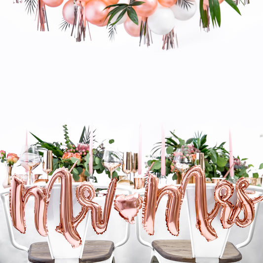 decorating idea wedding chairs: balloon Mr ad Mrs rose gold