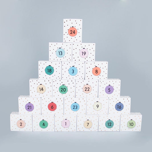 Advent calendar: golden star cardboard boxes and free printable.